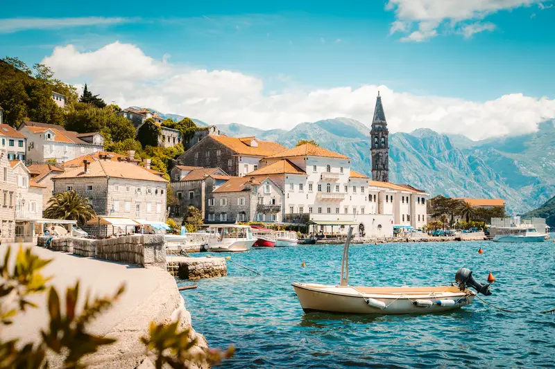 Montengro boats and water surrounded by mountains