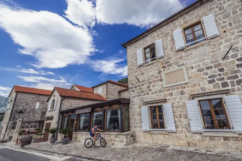 Hotel Conte brick building and restaurant in Montenegro