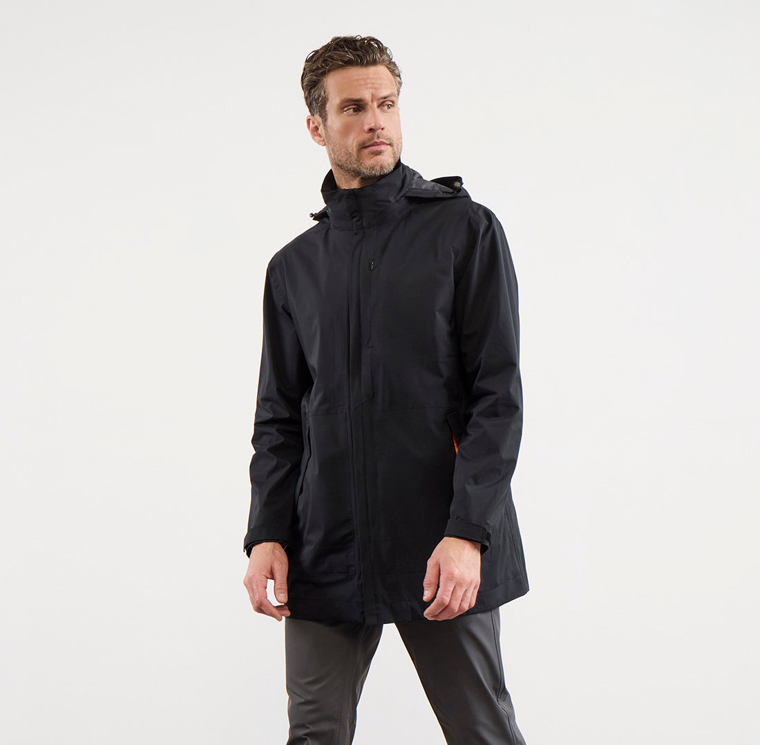 Bluffworks Faroe Rain Jacket in black, a packable waterproof travel rain jacket with eight pockets
